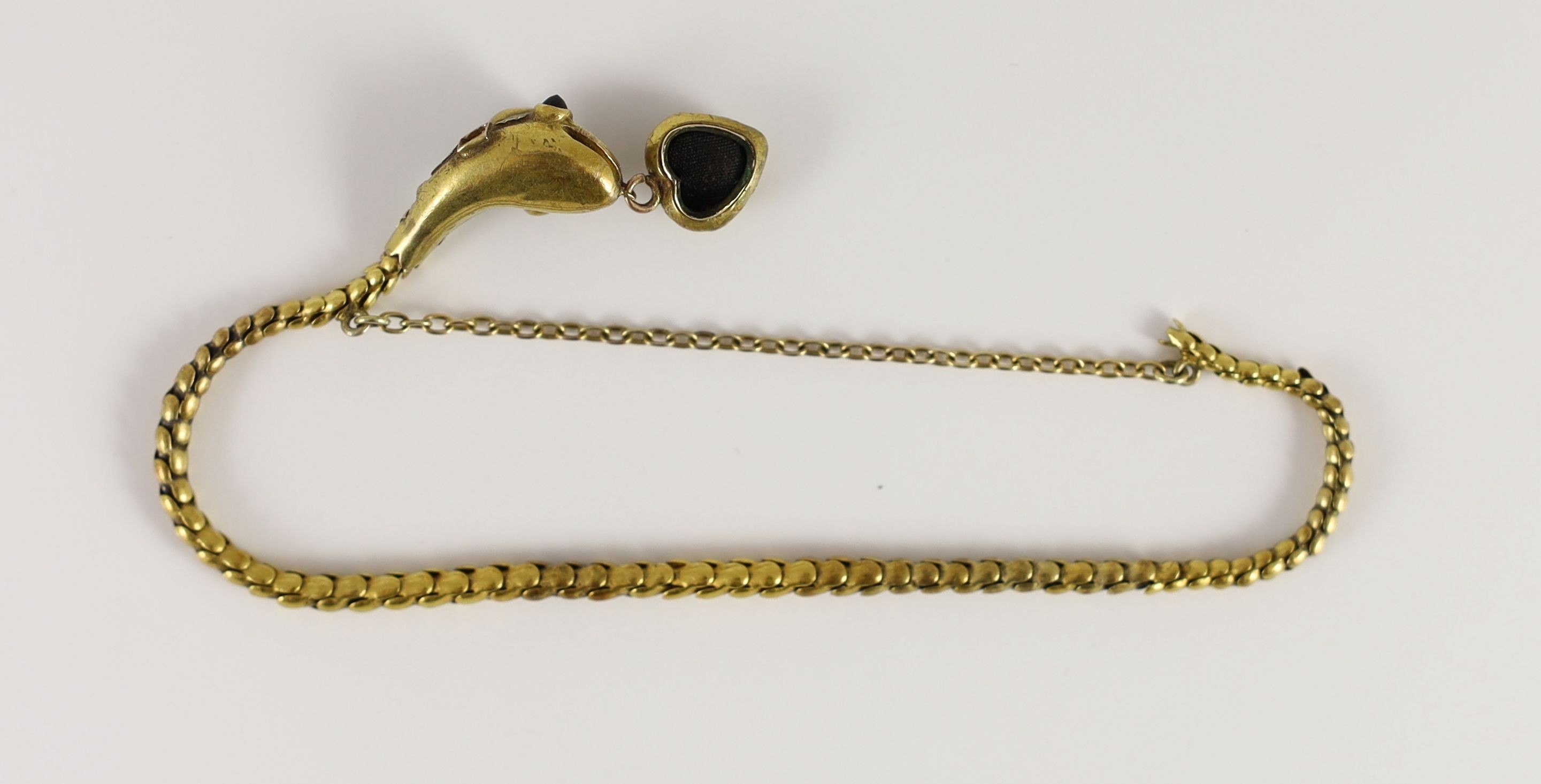 An early 19th century two colour gold and foil backed pink gem set serpent head and snake link bracelet